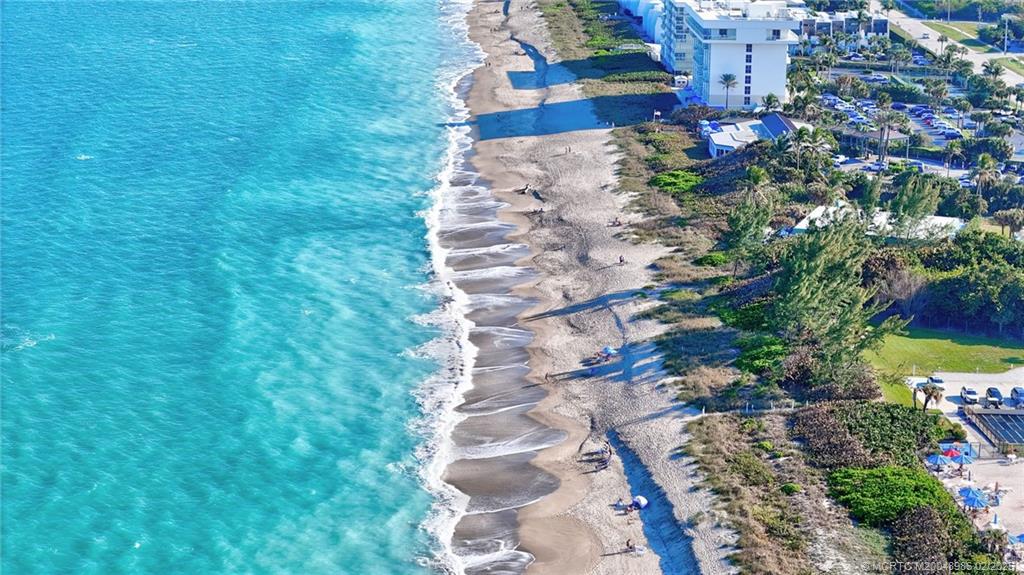 10725 South Ocean Drive, Unit 214 Jensen Beach, FL 34957 - Photo 54 of 90 a view of a yard