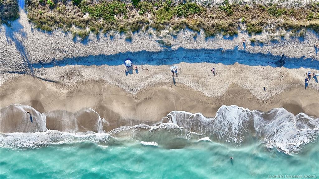 10725 South Ocean Drive, Unit 214 Jensen Beach, FL 34957 - Photo 75 of 90 a view of water view with a yard