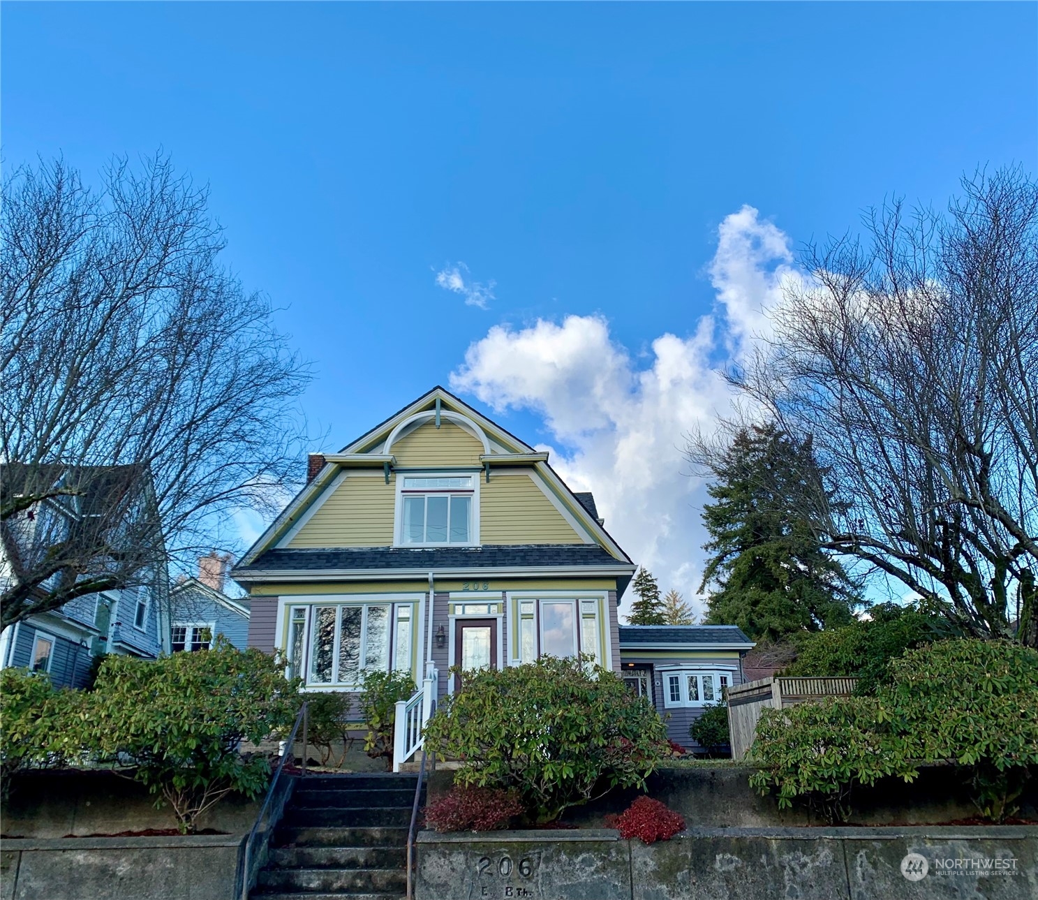 206 East 8th Street Aberdeen, WA 98520 - Photo 1 of 39 a front view of a house with a yard