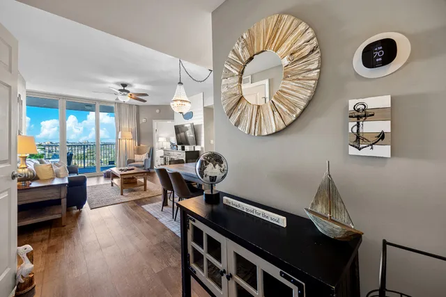 a kitchen with stainless steel appliances granite countertop a refrigerator a stove top oven a sink and dishwasher