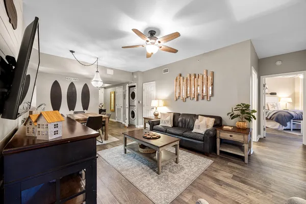 a view of a storage and utility room with washer and dryer