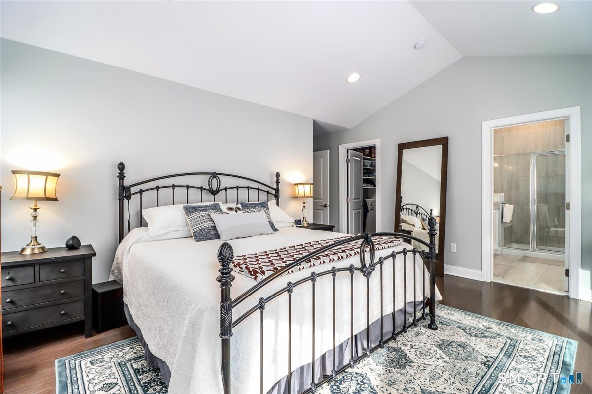 32 Hunting Ridge Lane, Unit 32 Bethel, CT 06801 - Photo 17 of 39 a bedroom with a bed and window