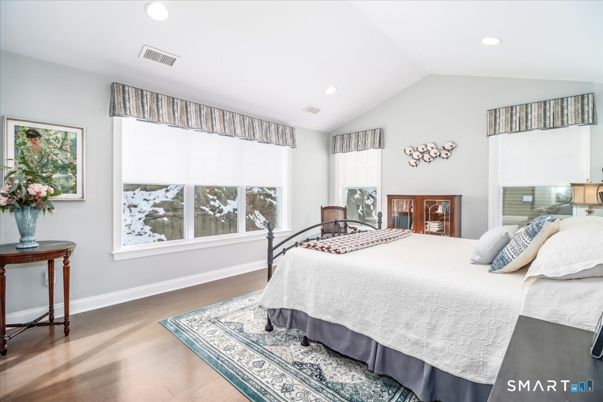 32 Hunting Ridge Lane, Unit 32 Bethel, CT 06801 - Photo 19 of 39 a bedroom with a large bed and a window
