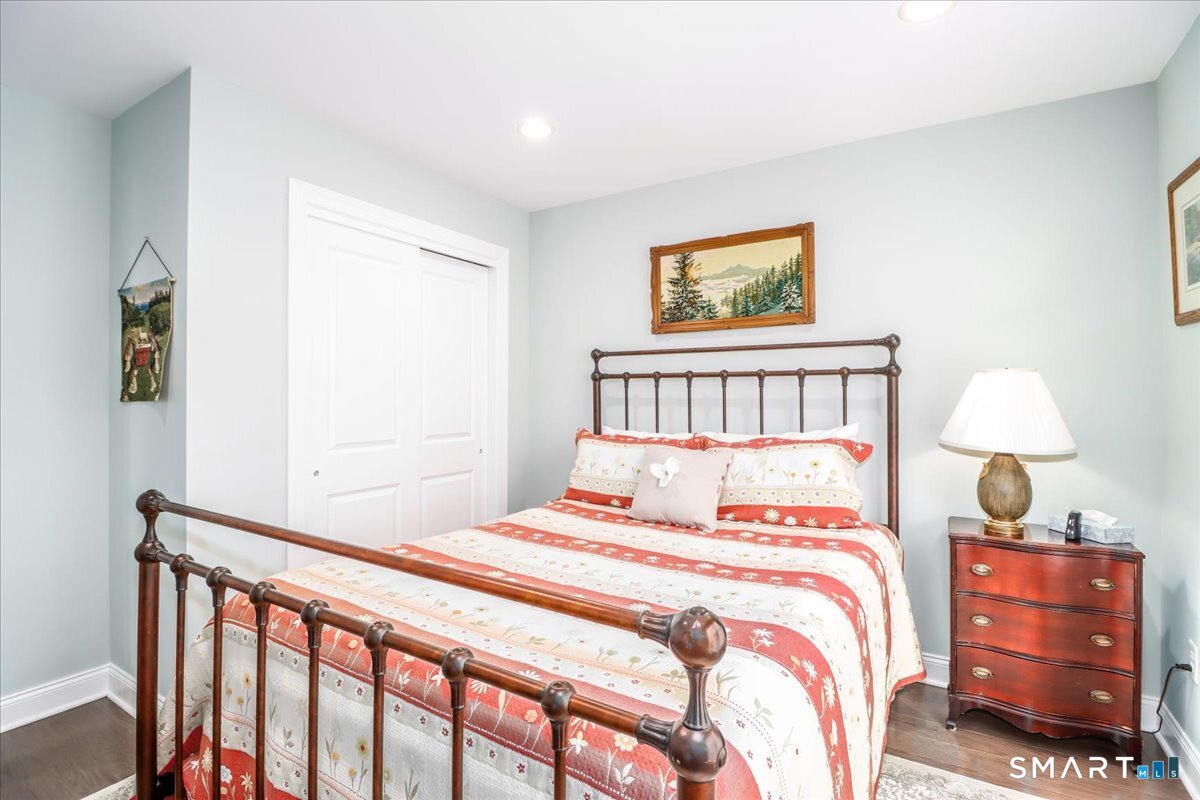 32 Hunting Ridge Lane, Unit 32 Bethel, CT 06801 - Photo 23 of 39 a bedroom with a bed and a window