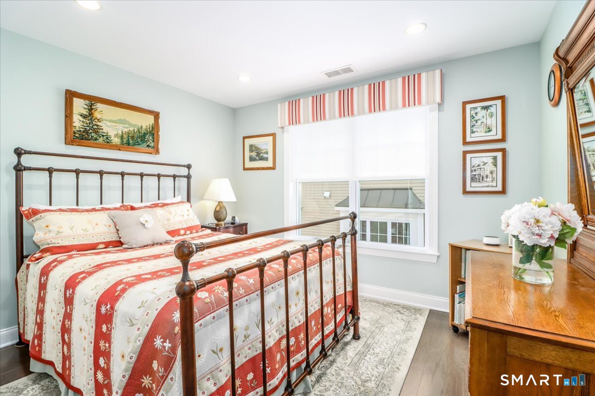 32 Hunting Ridge Lane, Unit 32 Bethel, CT 06801 - Photo 24 of 39 a bedroom with a bed and a window