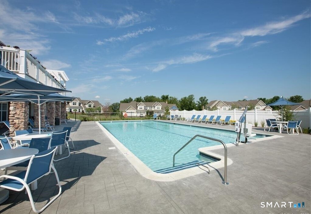 32 Hunting Ridge Lane, Unit 32 Bethel, CT 06801 - Photo 37 of 39 a view of a swimming pool and lounge chairs