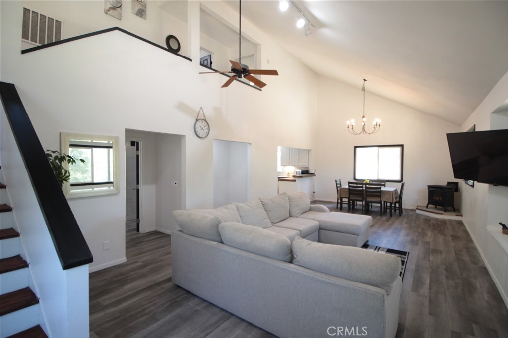 3616 Manzanita Road Mariposa, CA 95338 - Photo 4 of 18 a living room with furniture a flat screen tv and a window
