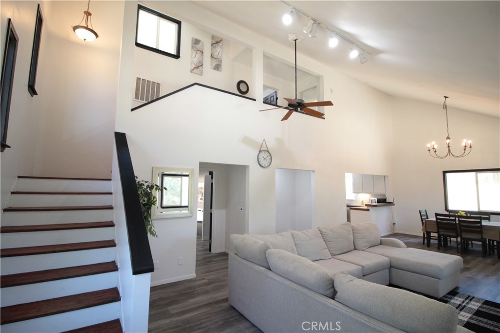 3616 Manzanita Road Mariposa, CA 95338 - Photo 7 of 18 a living room with furniture and a wooden floor