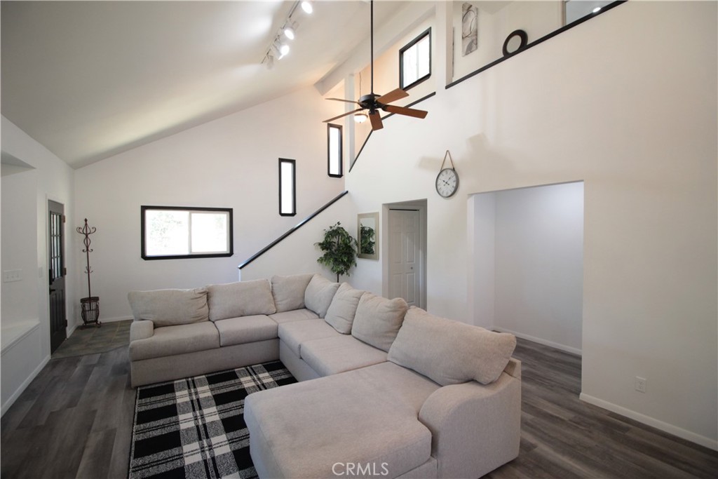 3616 Manzanita Road Mariposa, CA 95338 - Photo 8 of 18 a living room with furniture and a wooden floor