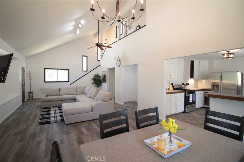 3616 Manzanita Road Mariposa, CA 95338 - Photo 10 of 18 a living room with furniture and wooden floor