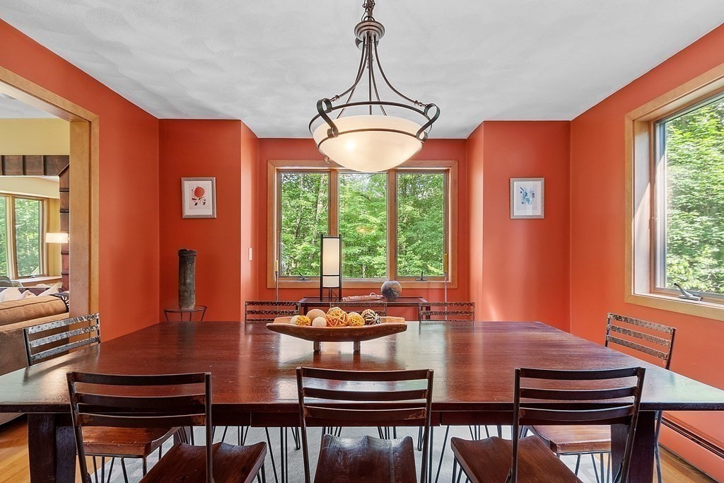 377 Sargent Road Boxborough, MA 01719 - Photo 15 of 42 a view of a dining room with furniture window and outside view