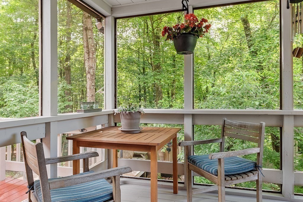 377 Sargent Road Boxborough, MA 01719 - Photo 21 of 42 a view of a dining room with furniture and a window