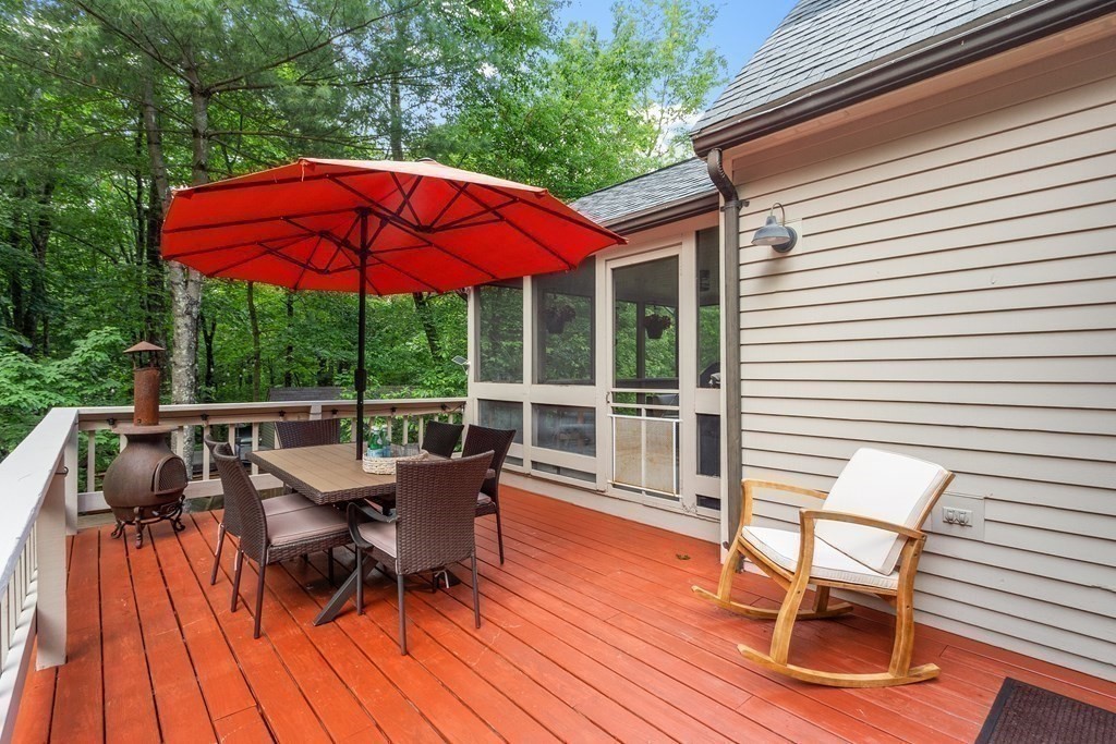 377 Sargent Road Boxborough, MA 01719 - Photo 22 of 42 a view of balcony with furniture and wooden floor