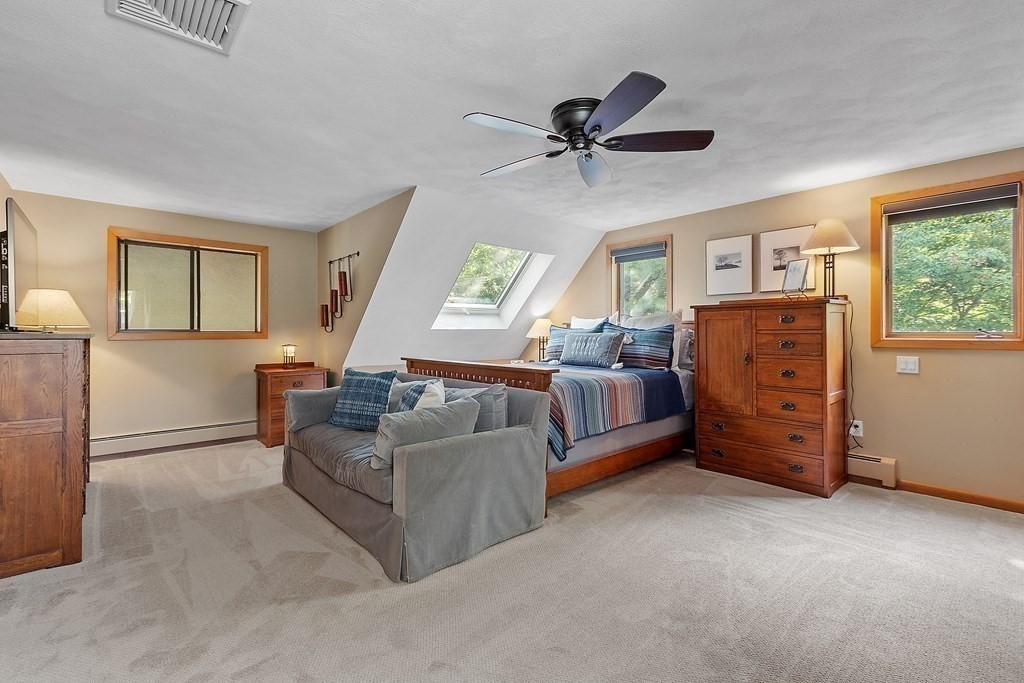 377 Sargent Road Boxborough, MA 01719 - Photo 25 of 42 a living room with furniture and a window