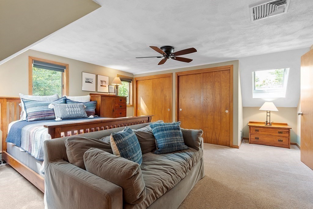 377 Sargent Road Boxborough, MA 01719 - Photo 26 of 42 a living room with furniture and a large window