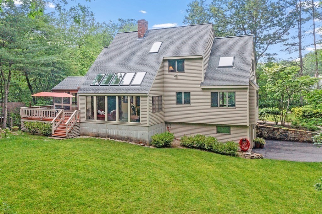 377 Sargent Road Boxborough, MA 01719 - Photo 3 of 42 front view of house with a yard