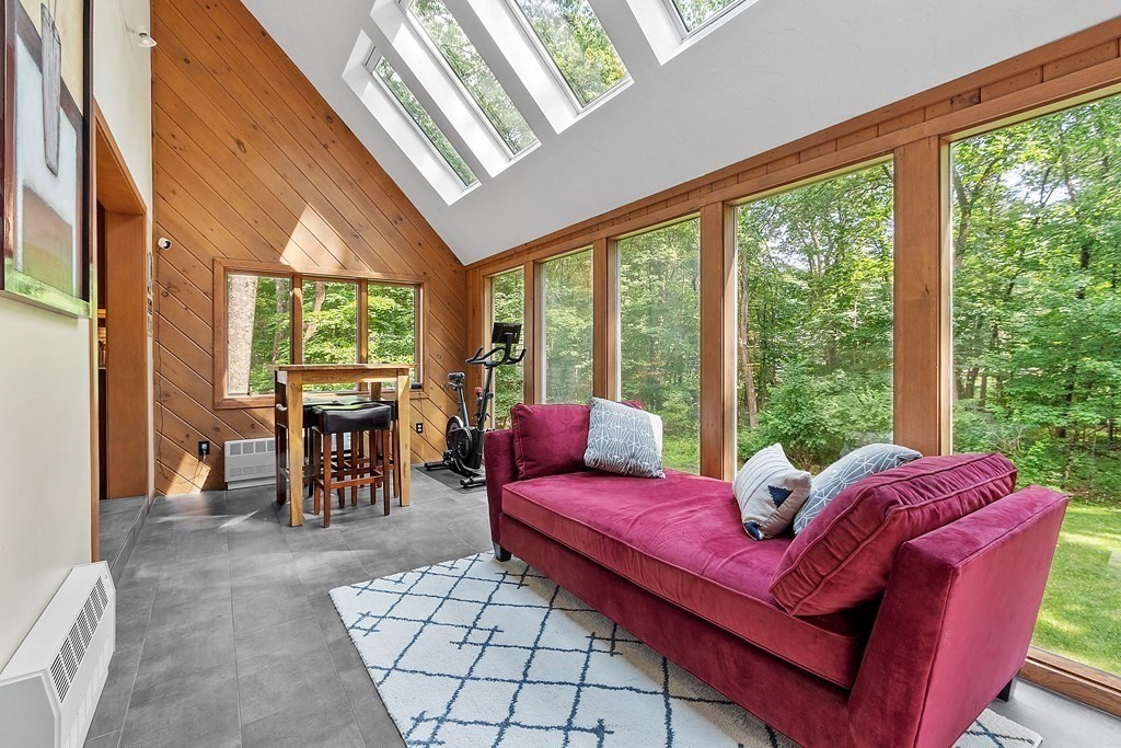 377 Sargent Road Boxborough, MA 01719 - Photo 10 of 42 a living room with furniture and a large window