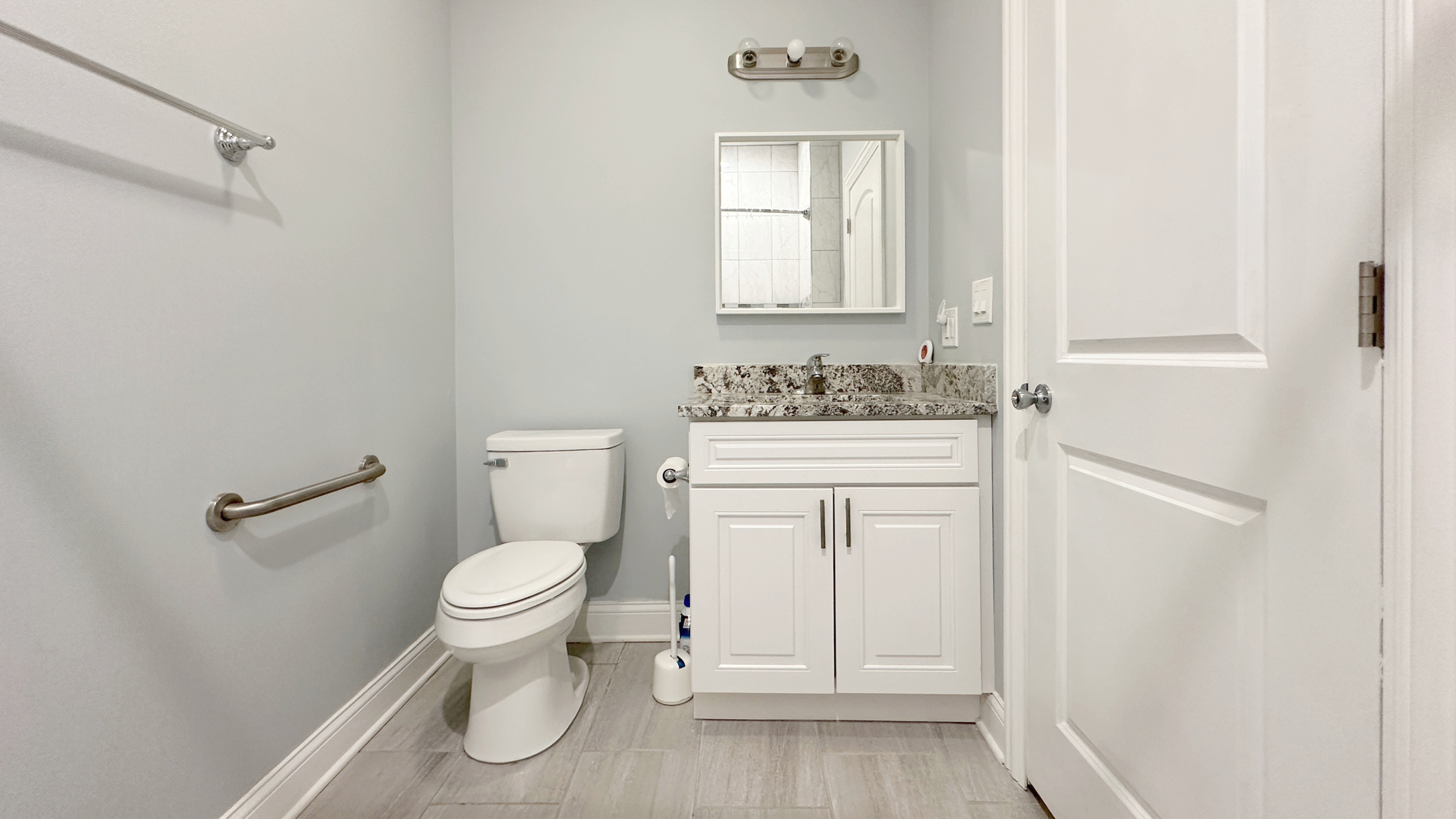 1538 West 34th Street, Unit E Chicago, IL 60608 - Photo 21 of 33 a bathroom with a sink toilet and window