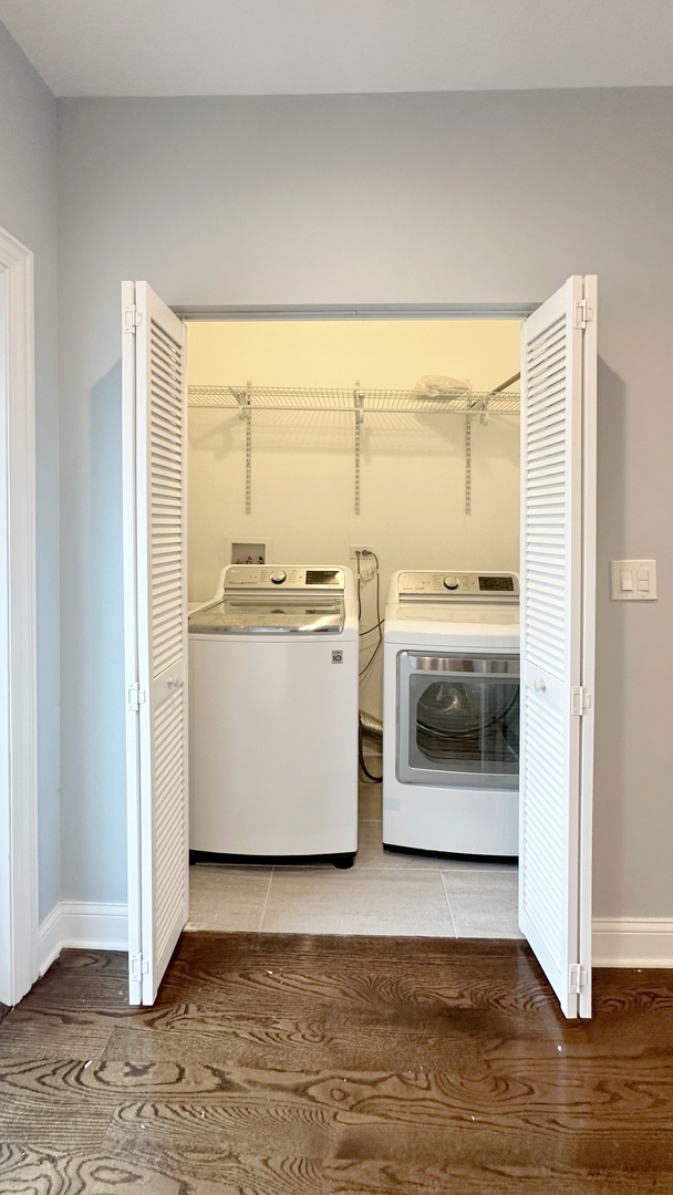1538 West 34th Street, Unit E Chicago, IL 60608 - Photo 29 of 33 a utility room with washer and dryer