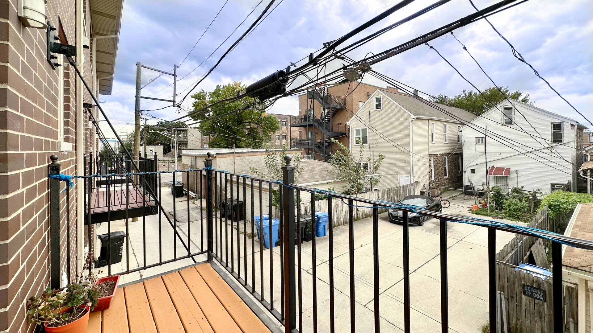 1538 West 34th Street, Unit E Chicago, IL 60608 - Photo 31 of 33 a view of a house with a small yard
