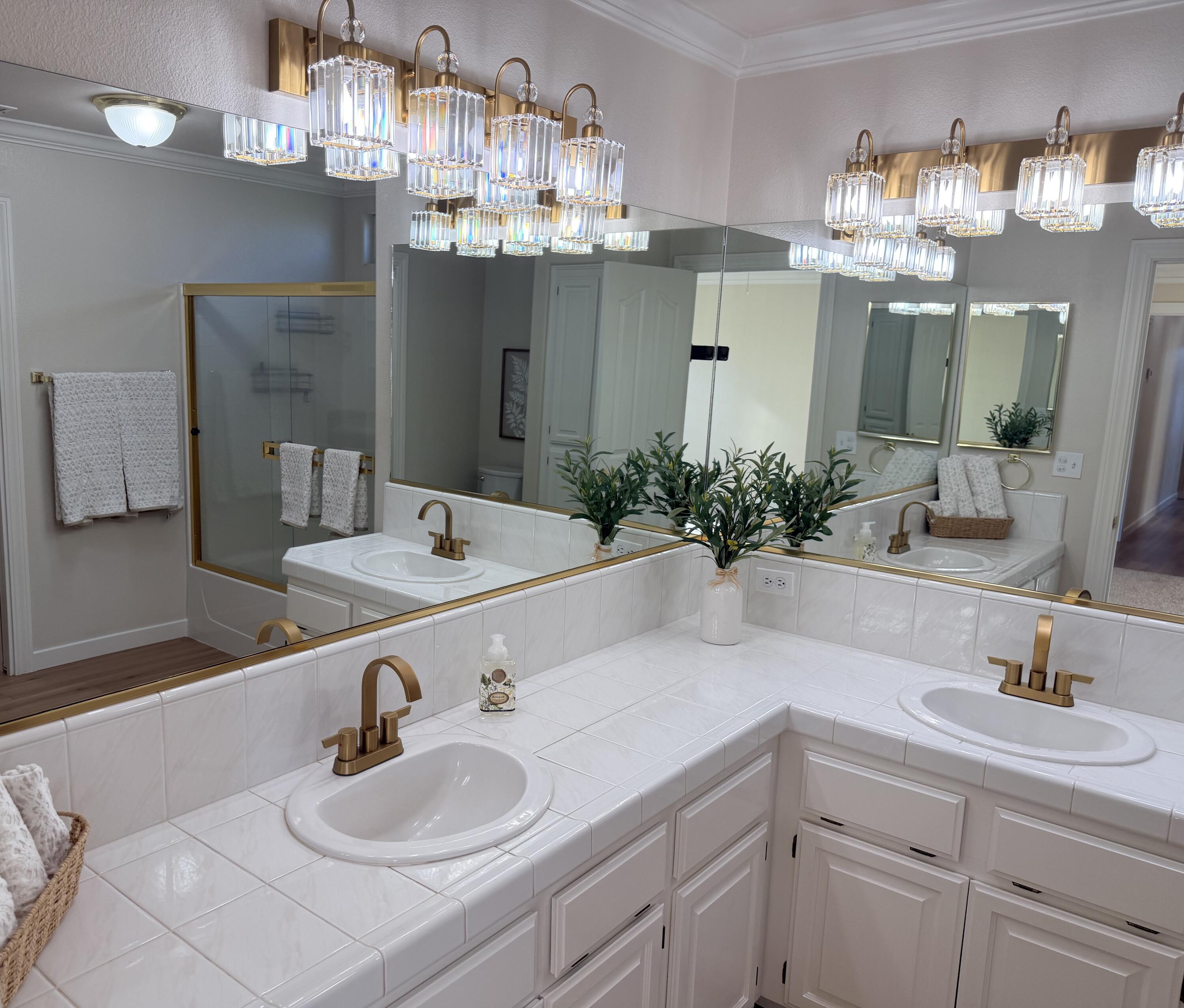 4365 Heather Ridge Lane Redding, CA 96001 - Photo 13 of 21 a bathroom with a sink double vanity and a mirror