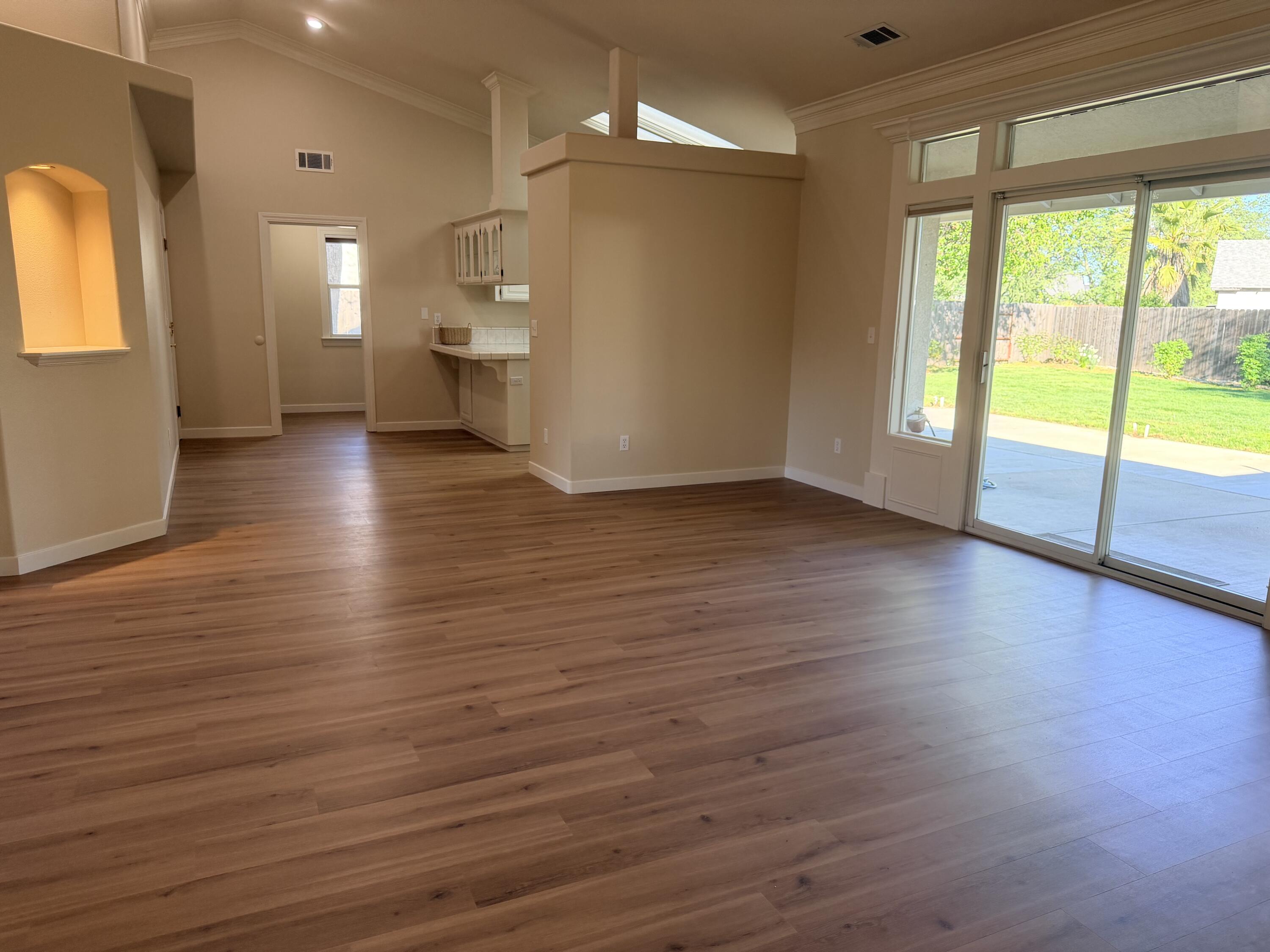4365 Heather Ridge Lane Redding, CA 96001 - Photo 6 of 21 a view of empty room with wooden floor and fan