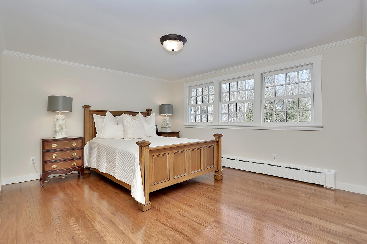 231 Turtle Back Road New Canaan, CT 06840 - Photo 17 of 22 a bedroom with a bed and window