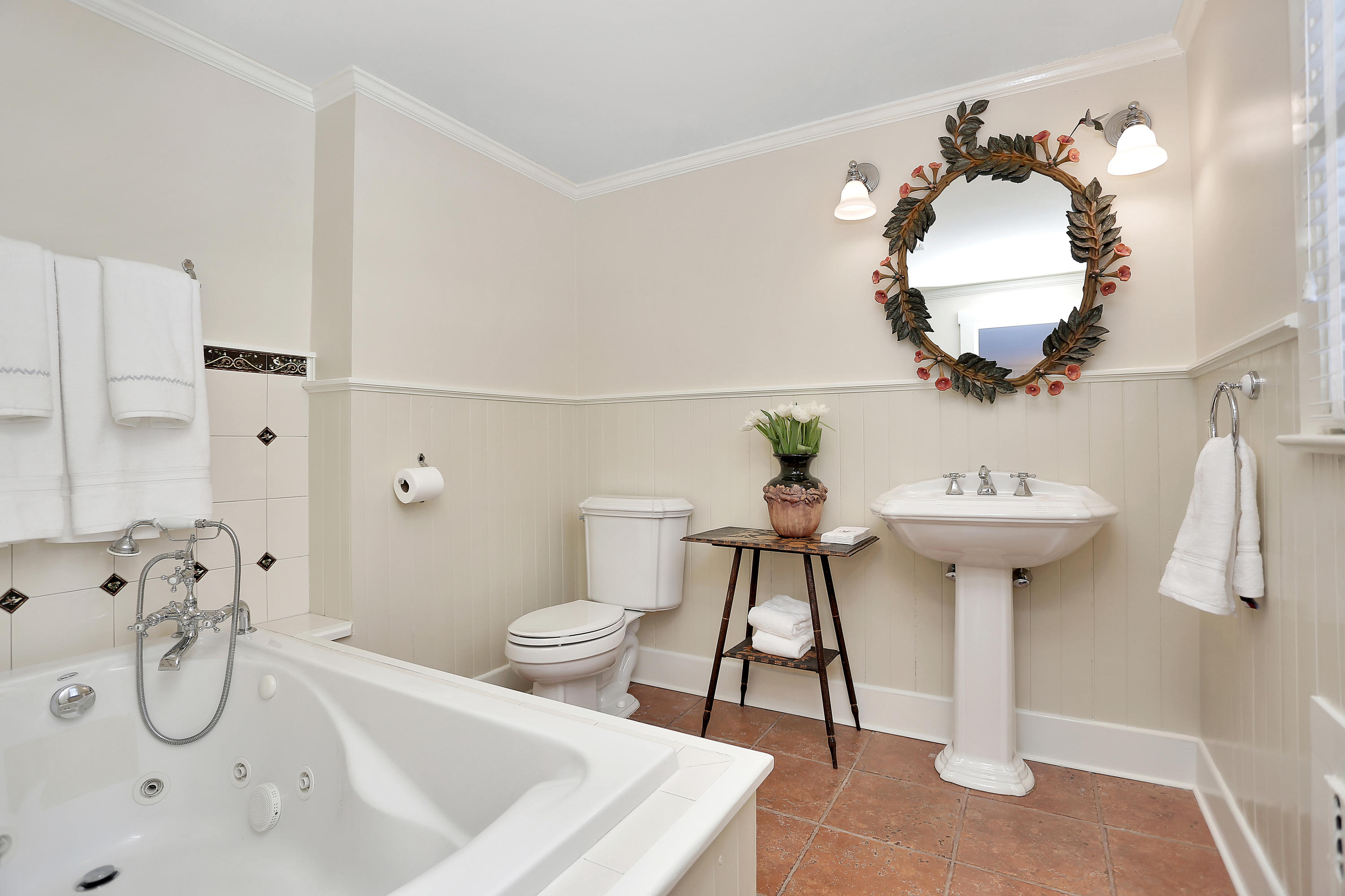 231 Turtle Back Road New Canaan, CT 06840 - Photo 18 of 22 a bathroom with a sink toilet and a mirror