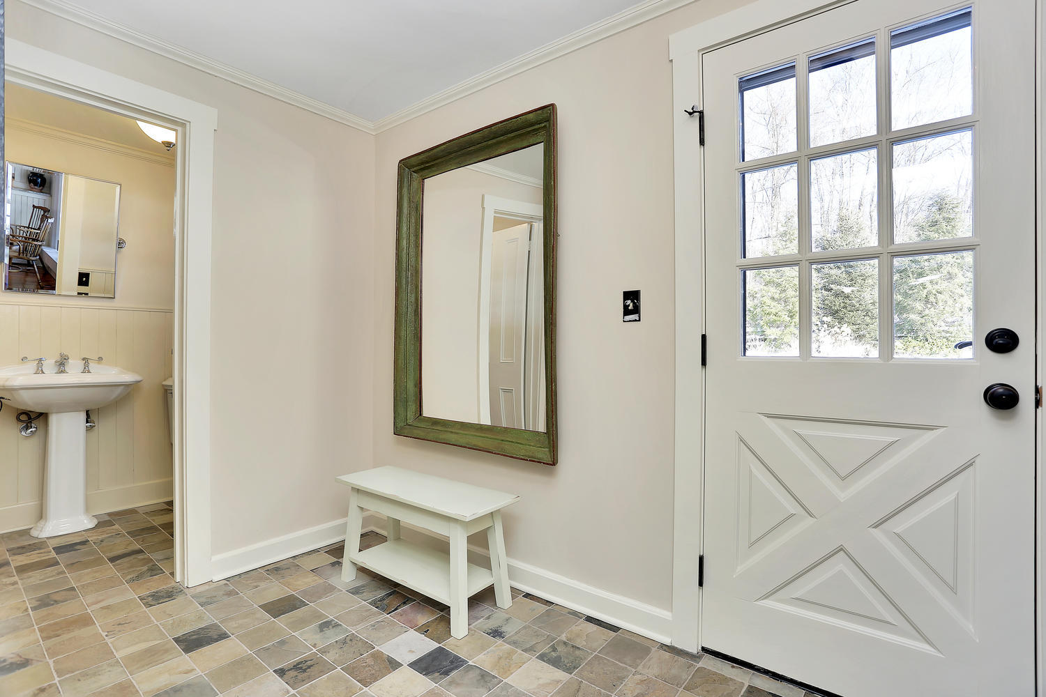 231 Turtle Back Road New Canaan, CT 06840 - Photo 20 of 22 a view of a livingroom with wooden floor and a window