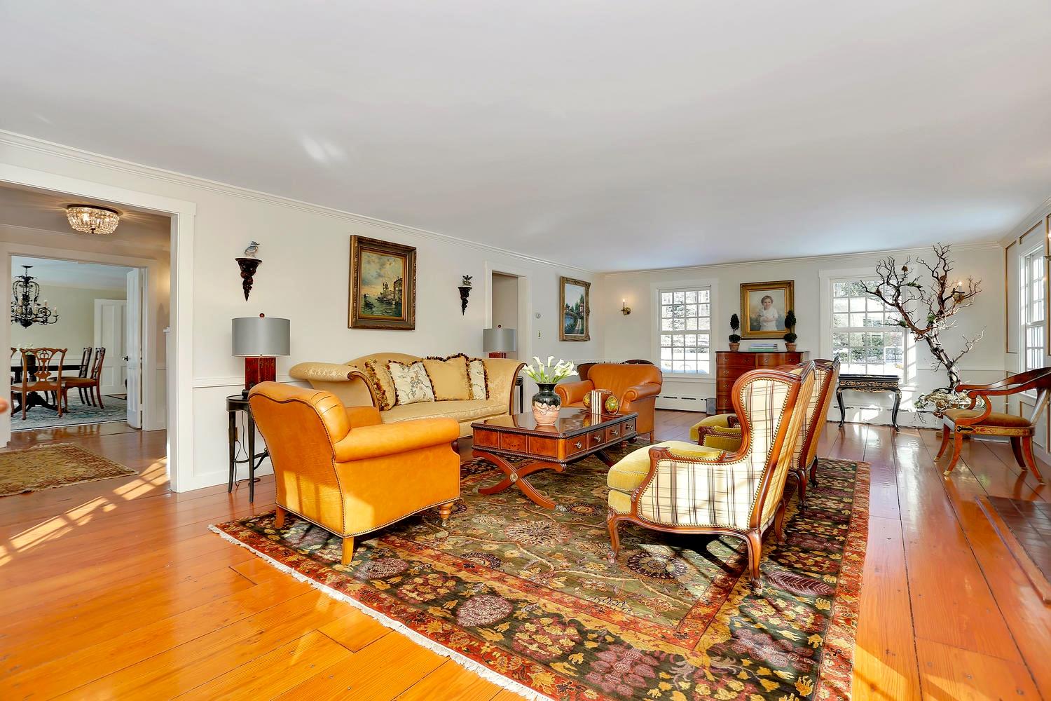 231 Turtle Back Road New Canaan, CT 06840 - Photo 5 of 22 a living room with furniture and a wooden floor