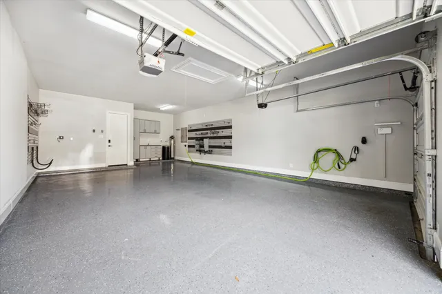 a view of a livingroom with furniture and staircase