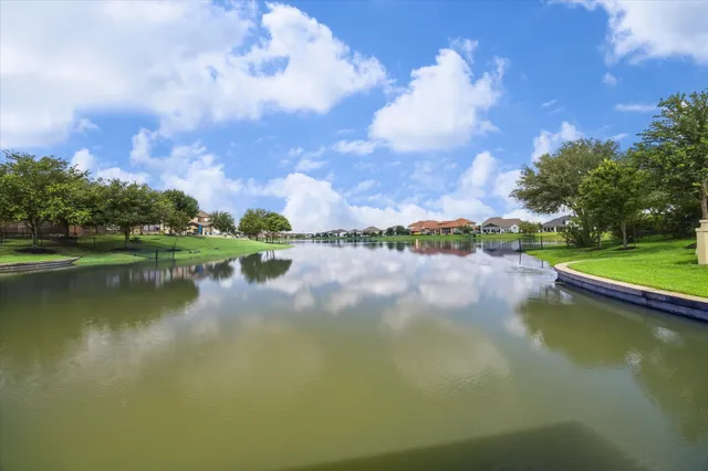 a view of a lake with a city