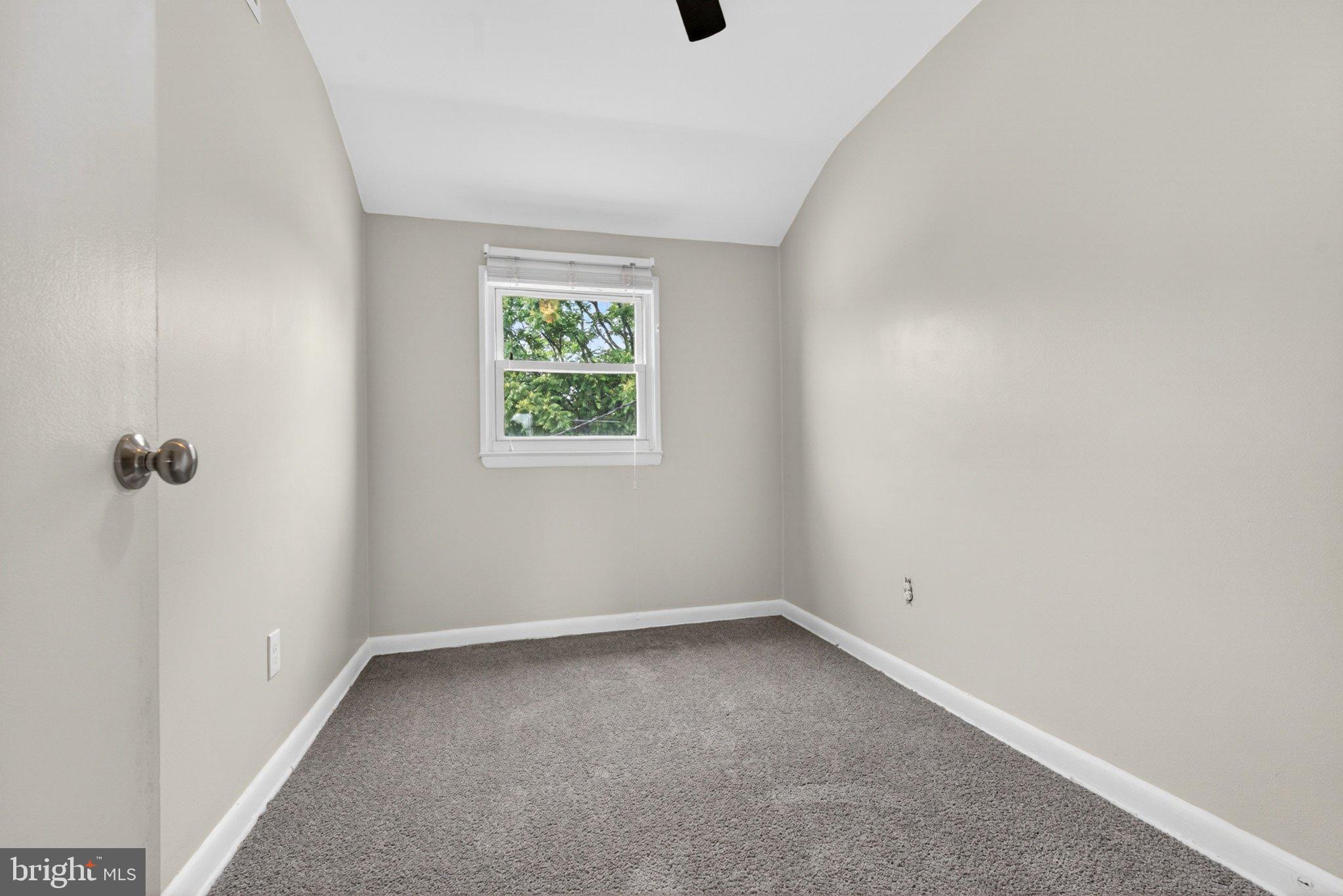 7729 Charlesmont Road Baltimore, MD 21222 - Photo 19 of 38 Bright and airy room with a view.