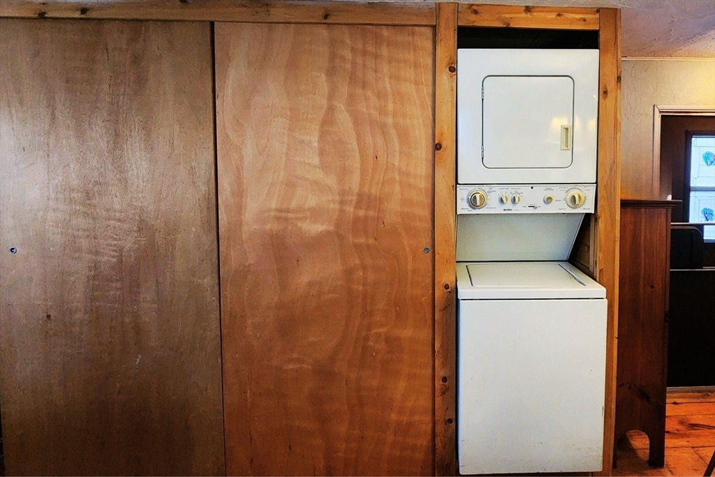3040 Cranberry Highway, Unit 34 Wareham, MA 02538 - Photo 12 of 14 a utility room with dryer and washer