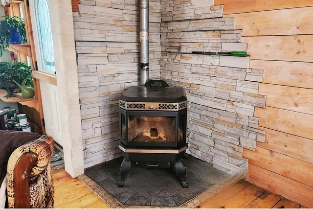 a backyard of a house with outdoor seating