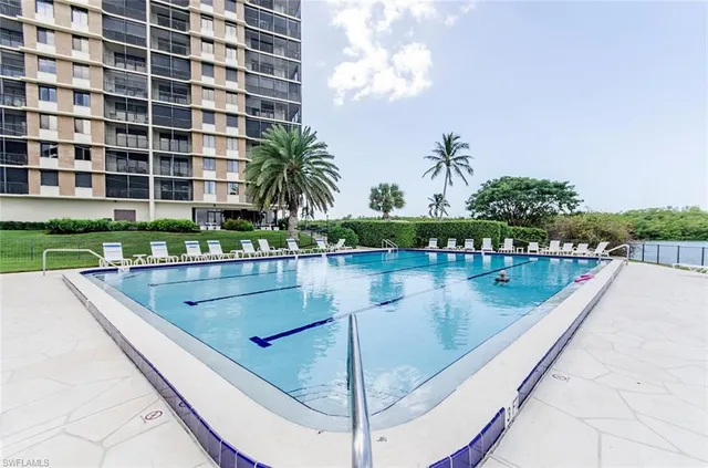 a view of swimming pool from a balcony