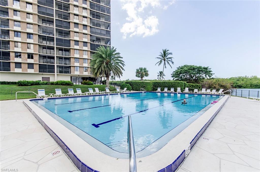 17 Bluebill Avenue, Unit 1102 Naples, FL 34108 - Photo 11 of 12 a view of swimming pool from a balcony