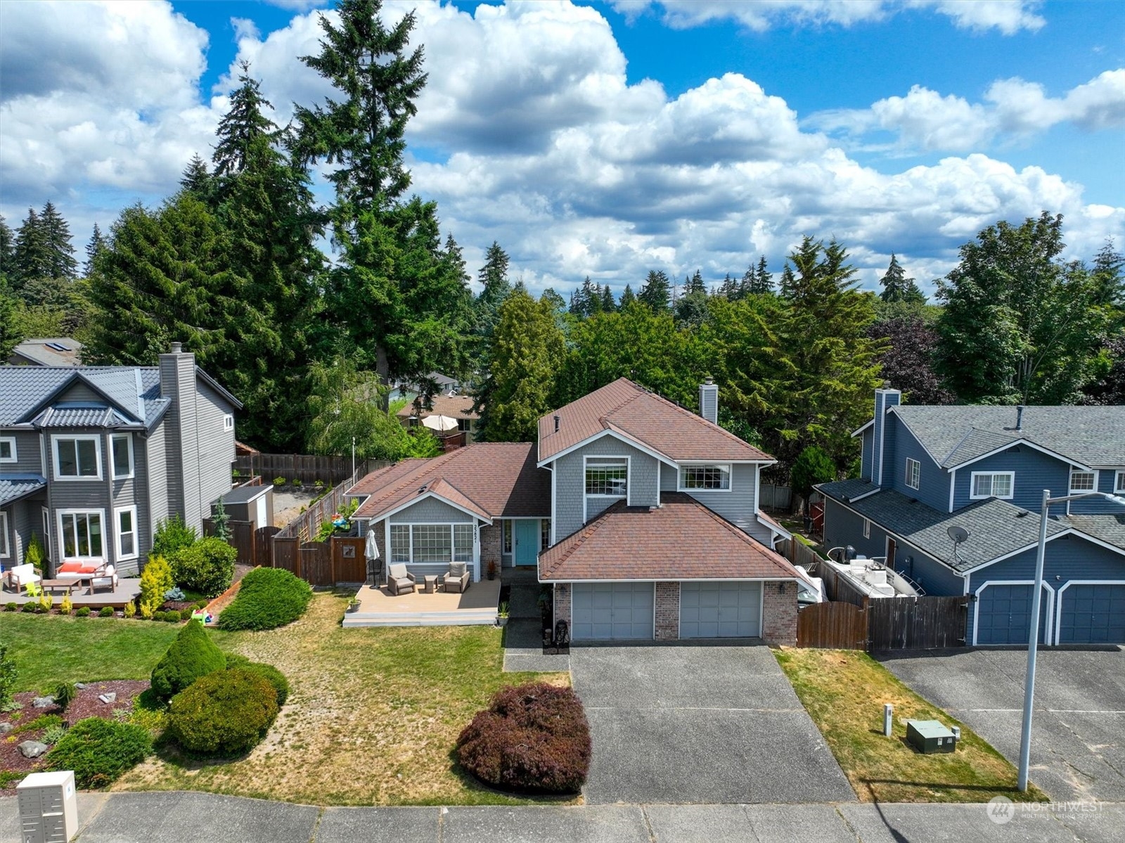 23821 2nd Avenue West Bothell, WA 98021 - Photo 3 of 40 a front view of a house with yard and green space