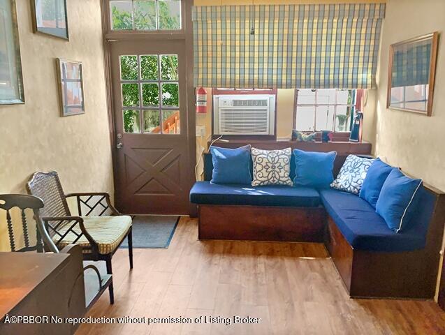 Undisclosed Address Palm Beach, FL 33480 - Photo 11 of 33 a living room with furniture and a window