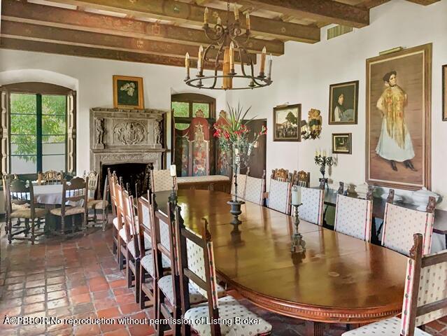 Undisclosed Address Palm Beach, FL 33480 - Photo 15 of 33 a view of a dining room with furniture a kitchen and chandelier