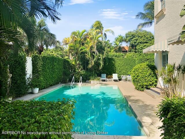 Undisclosed Address Palm Beach, FL 33480 - Photo 31 of 33 a view of yard with green space