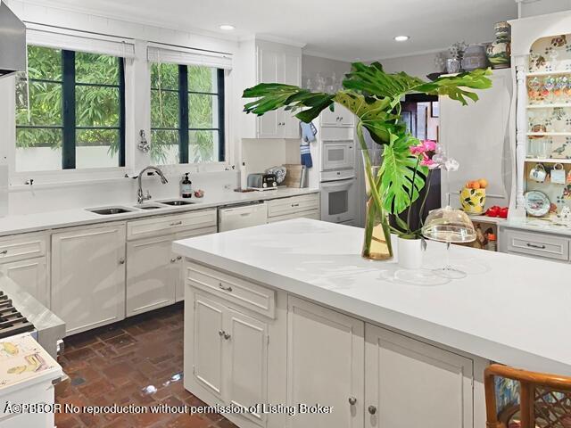 Undisclosed Address Palm Beach, FL 33480 - Photo 9 of 33 a kitchen with sink and window