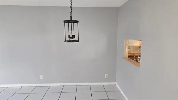 a view of an empty room with window