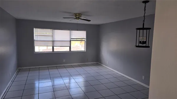 a view of an empty room and window