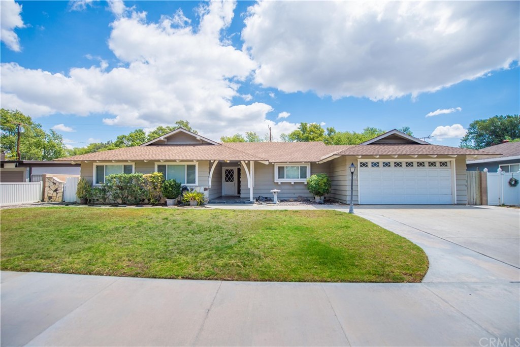 5204 Tower Road Riverside, CA 92506 - Photo 1 of 1 a front view of house with yard and green space