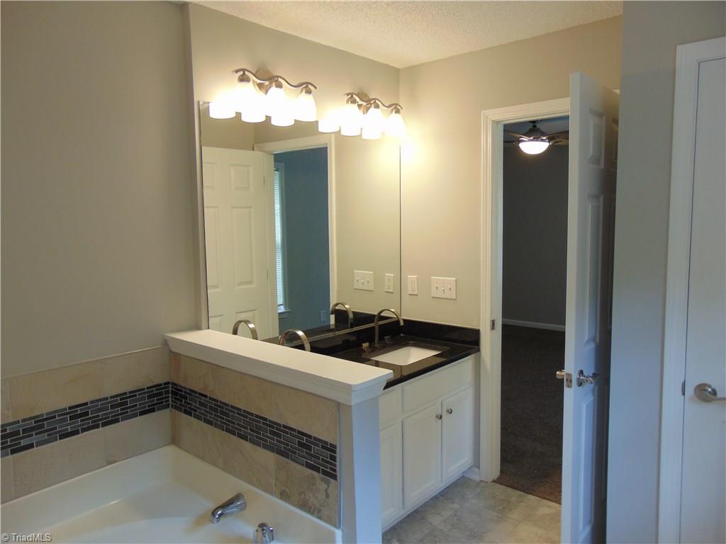 6819 Rangecrest Road Belews Creek, NC 27009 - Photo 12 of 30 View of master bath from shower enclosure looking in to bedroom space!
