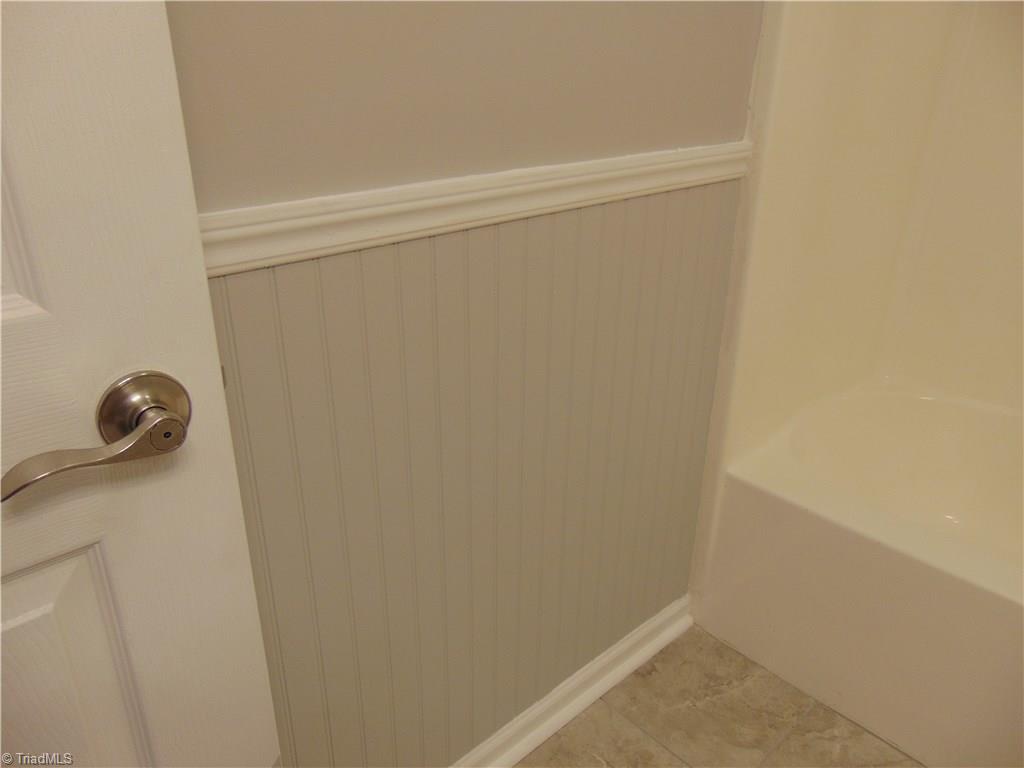 6819 Rangecrest Road Belews Creek, NC 27009 - Photo 18 of 30 Hall bathroom features bead board on lower half!