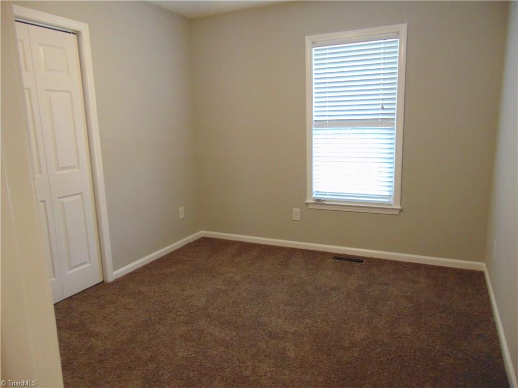 6819 Rangecrest Road Belews Creek, NC 27009 - Photo 19 of 30 Bedrooms have new carpet and ceiling fans!