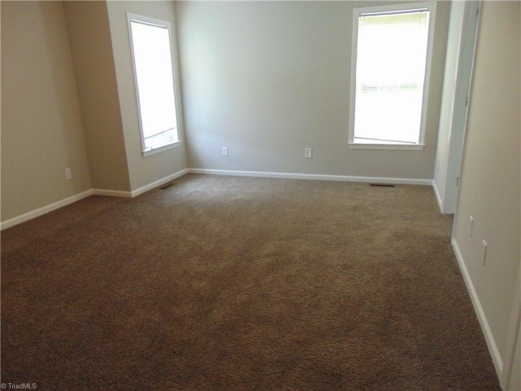 6819 Rangecrest Road Belews Creek, NC 27009 - Photo 21 of 30 Master bedroom is large enough for king bed with room to spare!