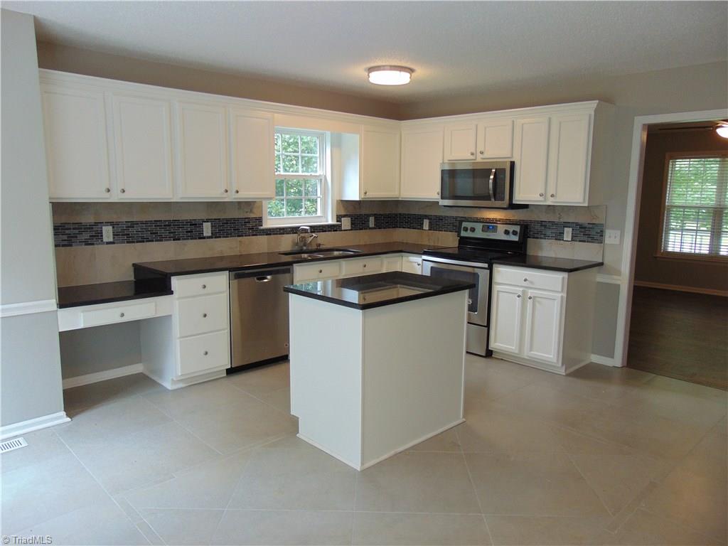 6819 Rangecrest Road Belews Creek, NC 27009 - Photo 5 of 30 Another view of the kitchen from area where your kitchen table can reside.